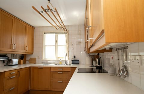 Kitchen with wall and base cupboards