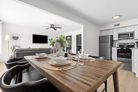 Set for an inviting meal with easy access to the living area.