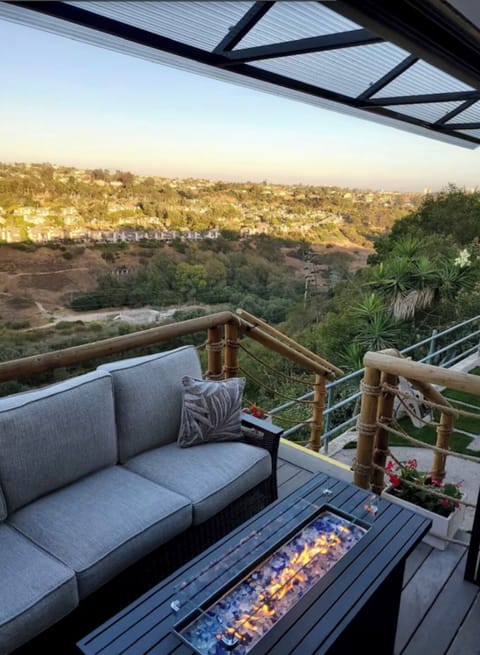 triple bifold doors opening up to amazing views.
