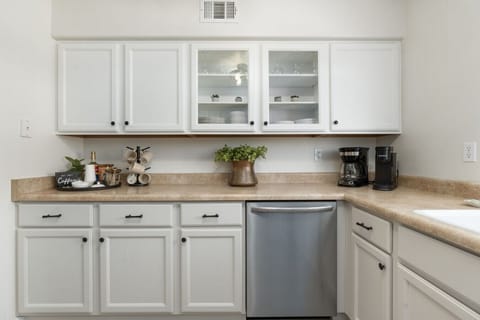 Spacious and spotless kitchen with a well-appointed coffee bar for your stay.