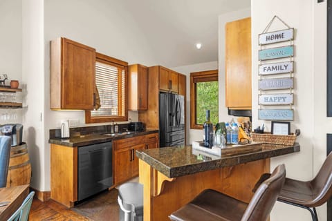 Kitchen: Drip coffee maker, Keurig, air fryer, Crockpot, toaster oven, blender, cooking utensils, tableware