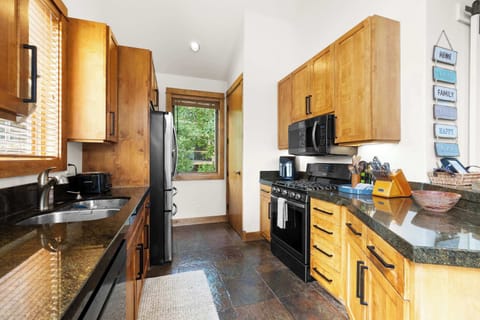 Kitchen: Drip coffee maker, Keurig, air fryer, Crockpot, toaster oven, blender, cooking utensils, tableware