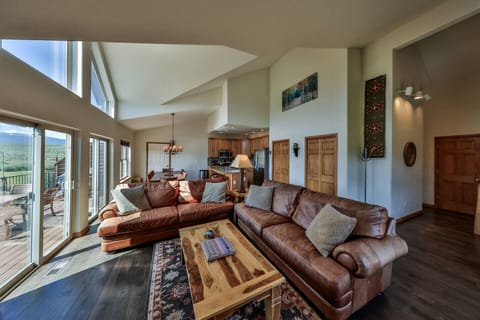 Soaring ceilings, comfy seating + endless Rocky Mountain views