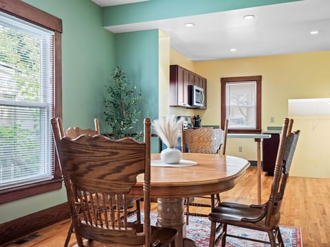 Bright dining room with natural light & cozy seating for family meals 🍽️🌿✨