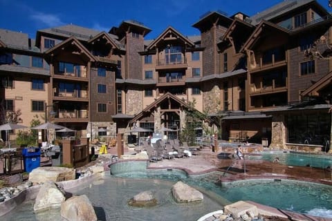 Outdoor pools and hot tubs facing mountain