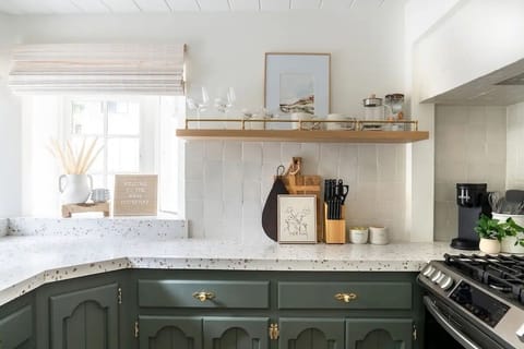 Fully stocked kitchen including Keurig coffee maker, French Press.