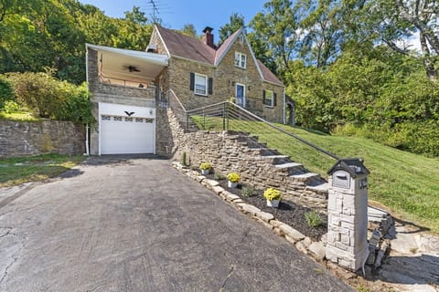 All stone house, front entrance steps. Guests can enter through garage or from porch front entry.