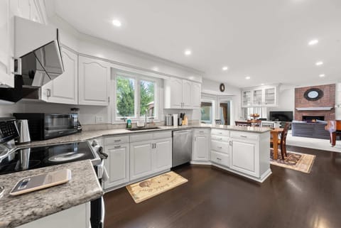 The open kitchen offers ample space & every home comfort