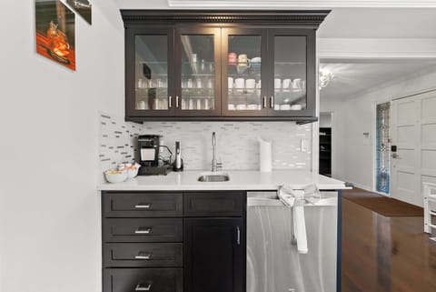 The dining room’s wet bar is ideal for whipping up after dinner coffee & cocktails