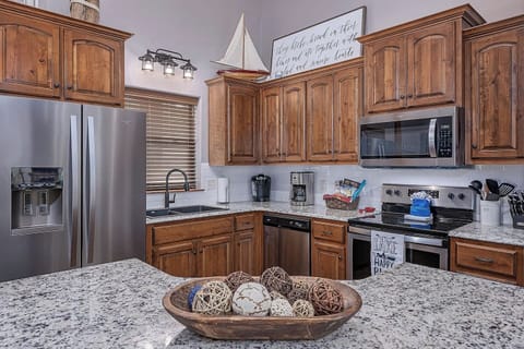 Kitchen stocked with all your cooking and baking needs for any food you may bring. Large pantry, stainless appliances, and granite