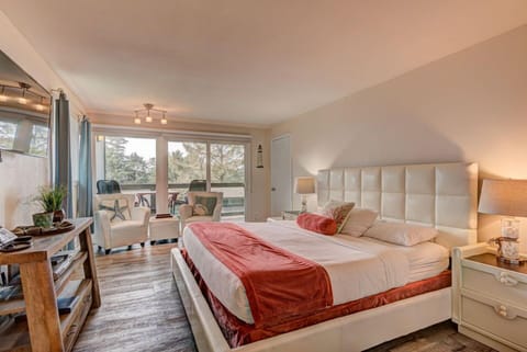 Experience coastal tranquility in this inviting 1 King Bedroom featuring a spacious king bed and an ocean-view balcony perfect for morning coffee.