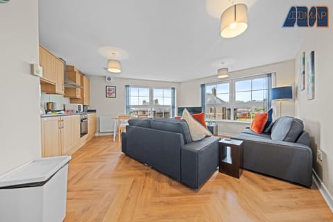 Relax in style with a spacious lounge featuring a comfy 2-seater and 3-seater sofa, plus a 65" Smart TV — perfect for unwinding after a long day.