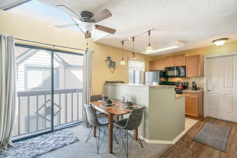 A spacious 3-seaters table with a fully-equipped kitchen