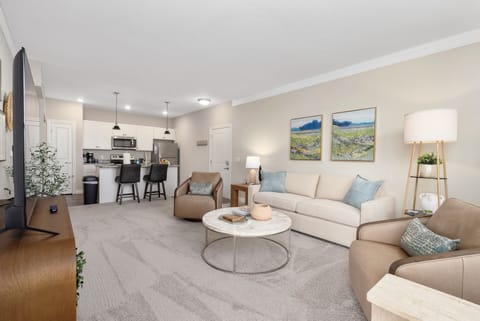 Spacious Open-Concept Living – Premium finishes and upscale furniture create the perfect space for entertaining or unwinding at home.