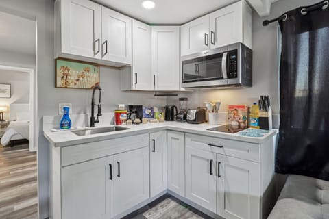 A modern kitchen, the heart of the home where cooking and memories are made.