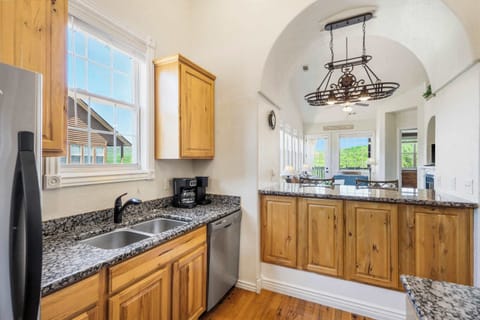 The inviting kitchen offers ample space & all the comforts of home