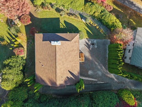 Aerial view showing spacious private lot and serene mountain setting