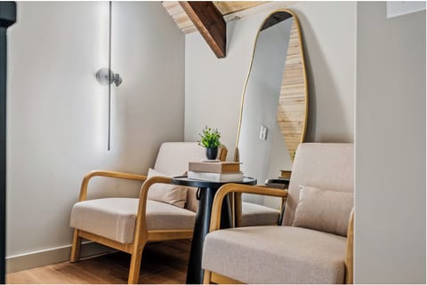 The top floor features a cute, quaint sitting area.