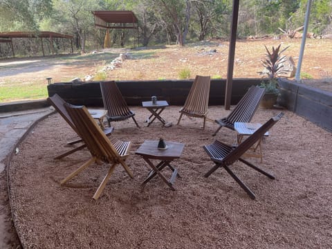 Sit and chat on the back porch under a fan. 