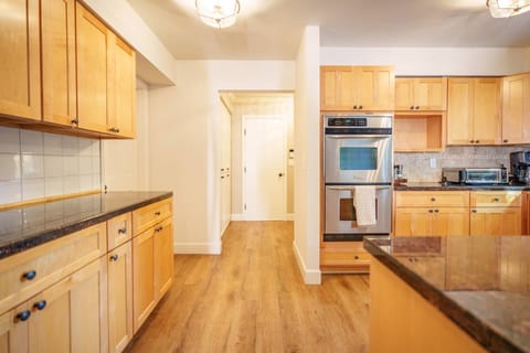 The kitchen has ample counter space and up to date appliances.