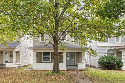 Exterior: Nestled under a canopy of green, our inviting home offers a peaceful retreat for your next escape.