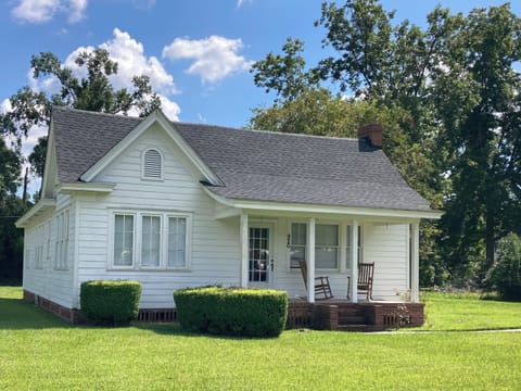Front view of house with porch.