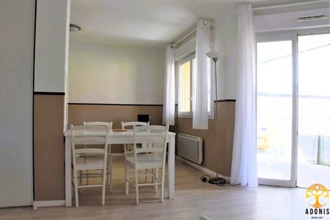 Gather for easy meals beside bright windows and fresh air.