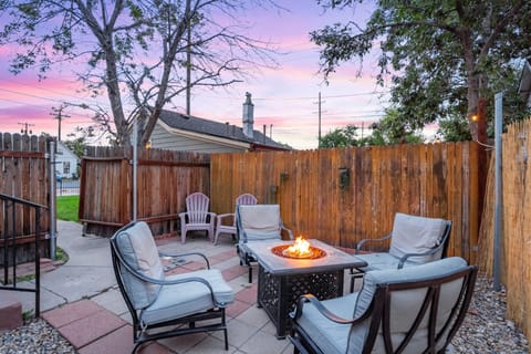 Time to enjoy the notorious Colorado weather gathered around the firepit in your private backyard!