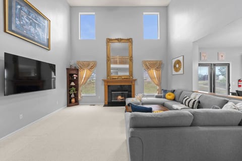 Curl up in the sophisticated living room & stream your favorites on the smart TV​