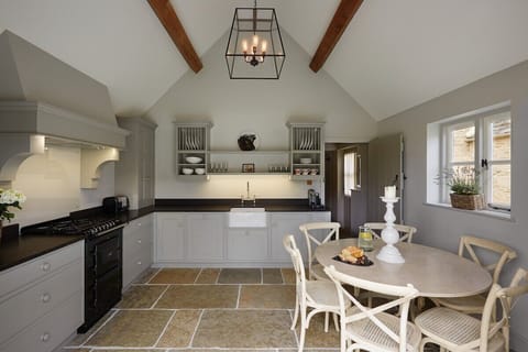 Open plan cooking and dining space.
