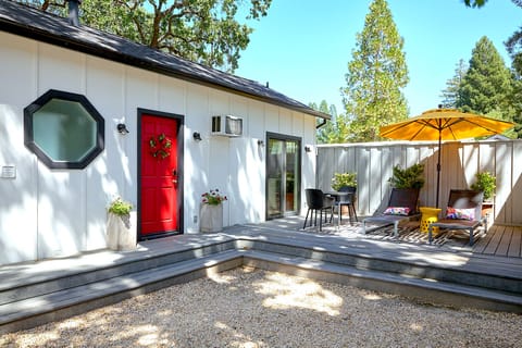 Charming deck with comfortable furniture, perfect for enjoying time outdoors.