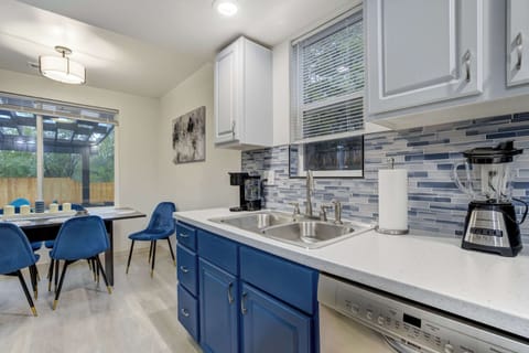 Open layout where the kitchen connects to the dining space, making group meals and conversations effortless.