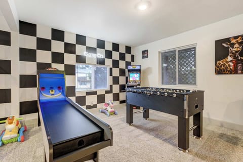 Welcome to Champion Court!  The shared game room is set up for fun with a skee-ball machine, foosball table, and classic arcade games, making it a favorite hangout for both kids and adults.