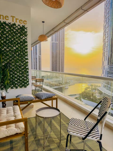 Private balcony offering breathtaking sunset views across JBR Marina