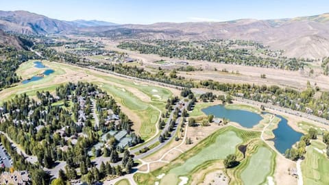 Surrounded by the Colorado Country Club of the Rockies Golf Course