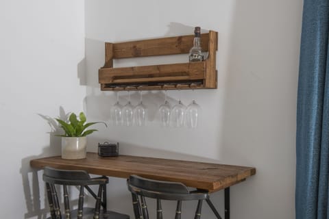 Bar area in the living room, with wine glasses
