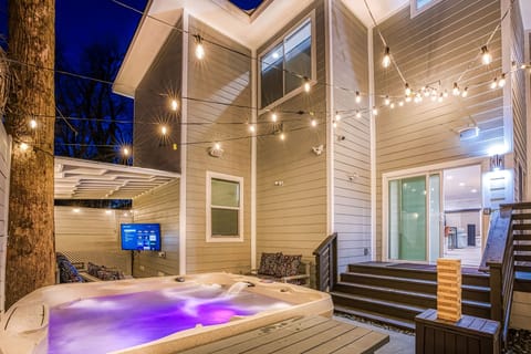 Play, relax, and soak in the colorful vibes of this inviting hot tub.
