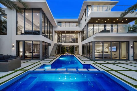 Gather your family and friends for an unforgettable stay. The expansive patio and stunning, illuminated pool provide the perfect backdrop for making lasting memories.