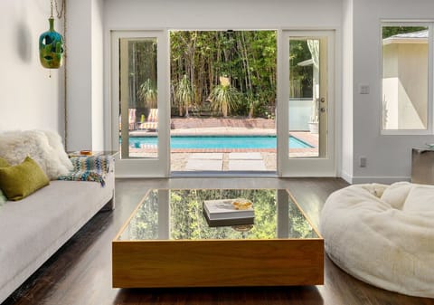 Casual family room with glass doors leading to outdoor area