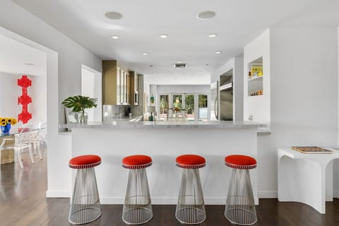 Fully equipped kitchen with breakfast bar and high-end appliances