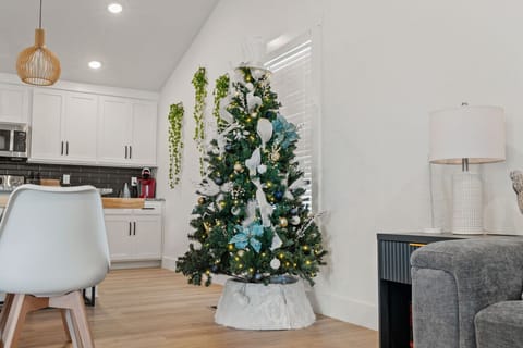 A beautifully styled Christmas tree adds the perfect touch of holiday magic to your stay.