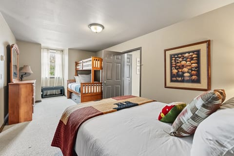 Bedroom 3: Queen bed with twin-over-queen bunk, upper floor, closet, dresser