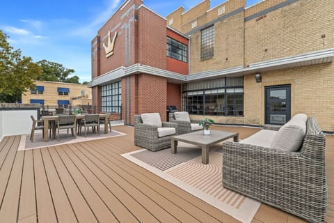 Rooftop-style patio perfect for entertaining or relaxing.