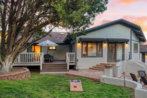 An inviting backyard oasis, perfect for relaxation and games.