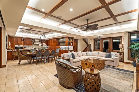 Gather with friends and family in this spacious lounge area with designer finishes at Laule'a #13.