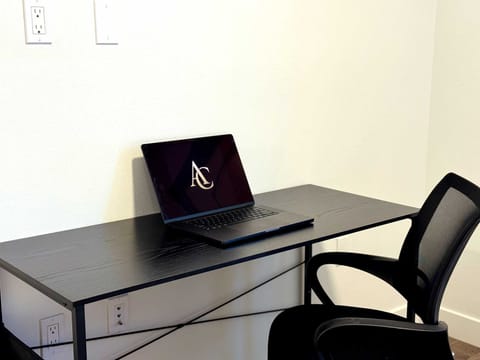 Enjoy the beautiful apartment with a dedicated workspace, complete with a private desk and ergonomic chair.