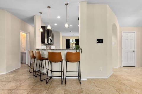 Well equipped this home has seating at the raised bar for 4, 2 more at the kitchen island and 6 more at the solid wood dining table. Great for a family get together.