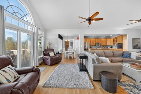 Flowing design that brings people together with ease, while enjoying lakeside views!