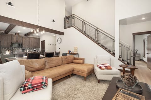 SWP 220 Quill Court living area with staircase