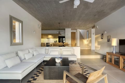 There's plenty of space for everyone in the luminous living area.